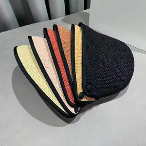 Multi-color woven sun hats with snap buttons and contrast trim in fan-shaped layout