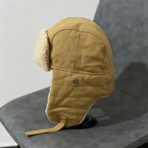 Khaki aviator hat with faux shearling lining and ear flaps for winter warmth