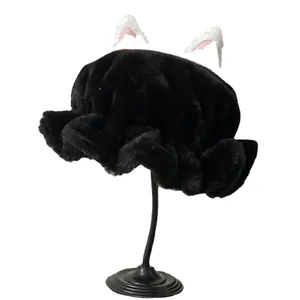 Japanese style black plush winter hat with cute cat ears on a display stand
