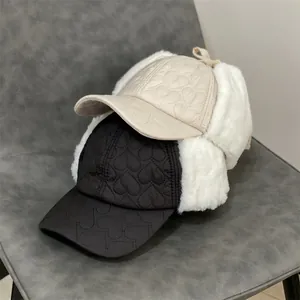 Padded heart embroidery aviator hats with faux fur ear flaps in beige and black colors