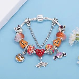 Handmade Halloween charm bracelet with silver snake chain and colorful glass beads