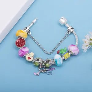 Tropical charm bracelet with enamel fruit charms and beads on silver snake chain