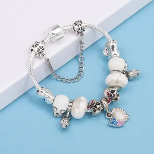 Bracelet tête de mort punk lumineux avec chaîne serpent et pendentif cœur papillon