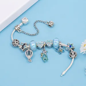 Blue Reindeer Charm Bracelet with silver snake chain and heart-shaped pendants