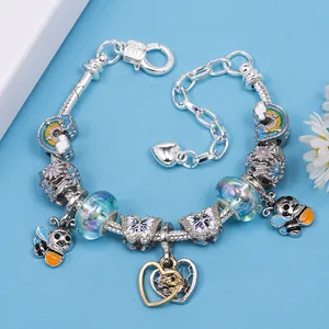DIY colorful bee and butterfly beaded charm bracelet with blue glass beads and silver chain