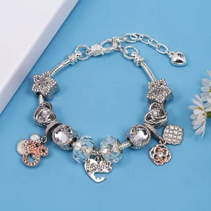 Zilveren kralenarmband met blauwe glaskralen en liefdeshart hanger voor vrouwen