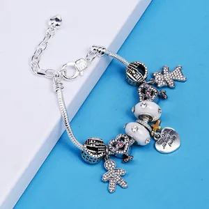 Romantic silver beaded charm bracelet with heart and teddy bear pendants on snake chain