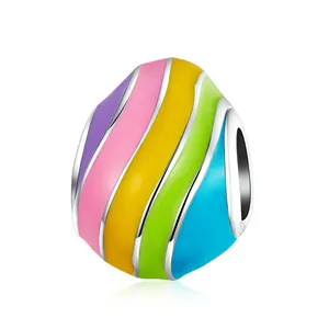 Easter egg charm with colorful striped enamel on polished silver-tone metal