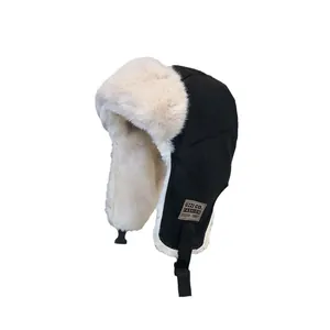 Winter thermal trapper hat with thick faux fur lining and ear flaps for extreme cold weather