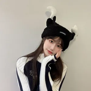 Cute black plush knitted hat with white horns and ears for autumn and winter warmth