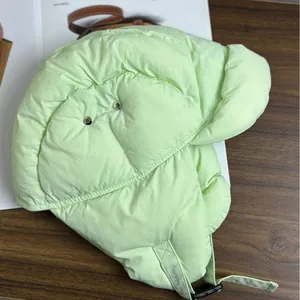 Light green quilted winter aviator hat with windproof fabric and warm ear flaps