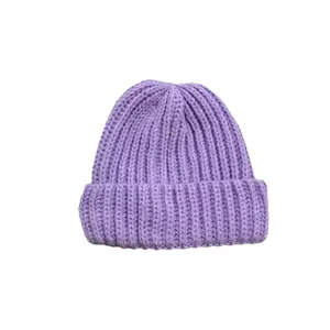 Thick lavender chunky knit beanie for women featuring a warm ribbed fold-over cuff design
