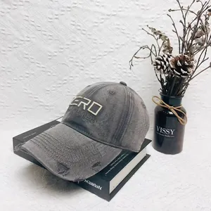 Vintage dark grey washed baseball cap with ZERO Everyday embroidery and distressed details