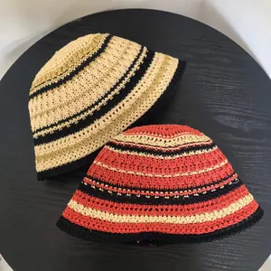 Handwoven striped knit bucket hats for women in beige and orange color variants