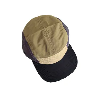 Outdoor 5-panel camper hat with multi-color patchwork and flat brim for sports