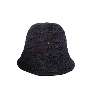 Minimalist black knitted hollow bucket hat with breathable crochet pattern for women