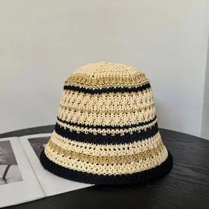Striped knit bucket hat with wide brim for sun protection in beige black and khaki
