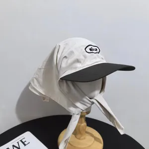 Beige outdoor sun hat with long neck flap and black brim for full sun protection