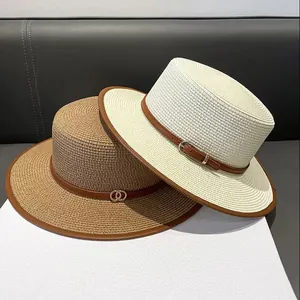 Flat top straw boater hats in beige and khaki with leather bands for sun protection