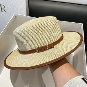 Classic summer straw boater hat with a brown leather band and silver buckle detail