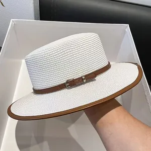 Chic white straw boater hat with brown leather trim and metal buckle for summer sun protection