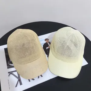 Breathable hollow-out straw baseball caps in beige and cream for summer sun protection