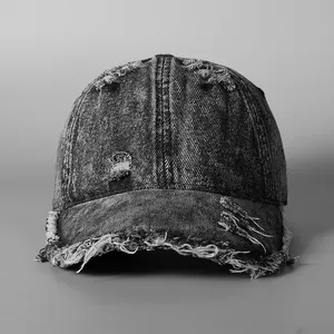 Vintage washed denim baseball cap with distressed frayed edges in dark charcoal grey