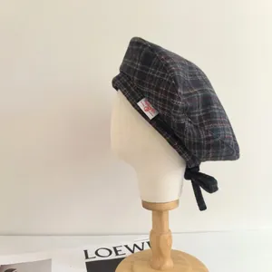 Béret à carreaux vintage en mélange de laine avec détail de nœud papillon élégant