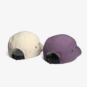 Detail of adjustable buckle strap and metal vents on 5-panel quick-dry baseball caps