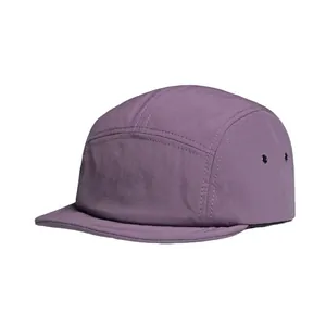 Deep purple five-panel camp hat featuring water-resistant fabric and metal eyelets