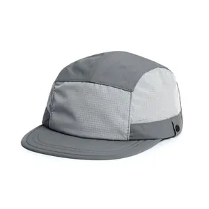 Detail shot of the breathable mesh stitching and metal snap on this five-panel cap