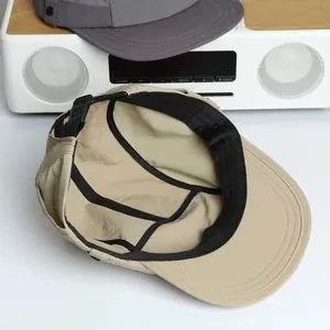 Internal details of 5-panel cap showing sweatband and adjustable buckle strap