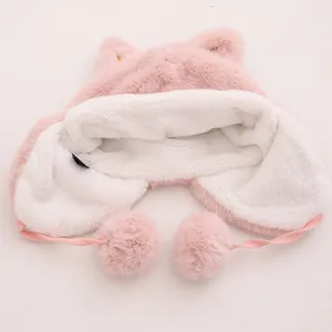 Rosa Plüsch Kindermütze mit Fuchs-Ohren, Bommeln und warmem Kunstfellfutter