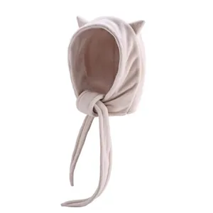 Winter plush devil horn cat ear beanie with fleece earflaps and long straps in cream