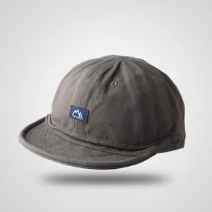 Charcoal grey soft top short brim baseball cap with canvas texture and vintage patch