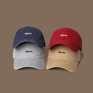 Close-up of four wide-brim baseball caps with Pyevien embroidery in multiple colors