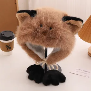 Detail of plush cat ear hat with brown faux fur and black paw-shaped drawstring ties