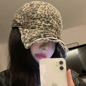 Retro leopard print baseball cap with frayed edges and vintage embroidery for a street style look