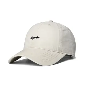 Classic beige cotton baseball cap with black letter embroidery and curved brim