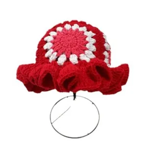 Handmade red crochet knit beanie with white floral top and ruffled brim style