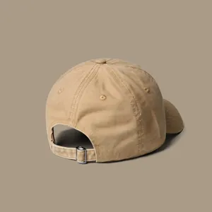 Detail of khaki cotton baseball cap back with adjustable silver metal buckle and strap