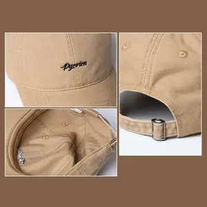 Close-up of khaki cotton baseball cap with letter embroidery and metal buckle detail