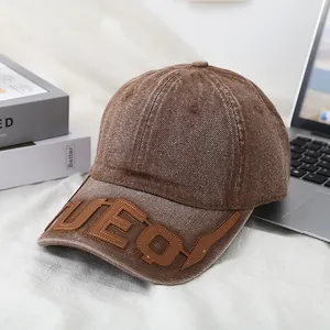 Vintage brown washed denim baseball cap with stitched UEO leather letters for men and women