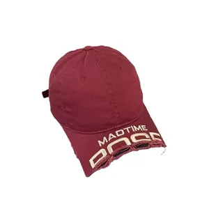 Vintage burgundy washed baseball cap with distressed short brim and white embroidery