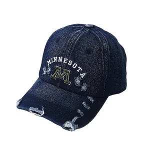 Distressed blue denim baseball cap with M embroidery and Minnesota lettering for outdoor sports