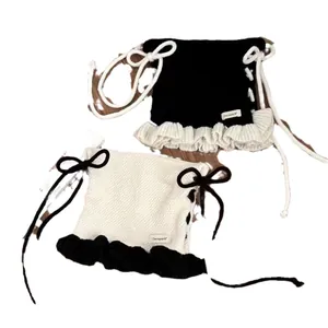 Ensemble de culottes en tricot pour bébé avec nœuds et bords volantés noir et beige