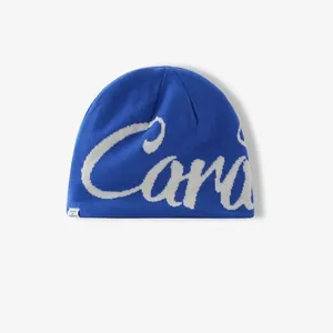 Navy blue knit beanie featuring white script Cara jacquard and ear protection detail