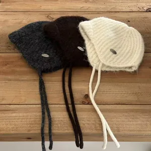 Winter wool knitted earflap beanies in dark grey, coffee, and beige with metal logo decor