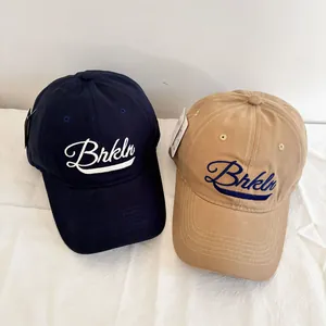 Vintage Brooklyn embroidered baseball caps in navy and khaki with premium cotton finish