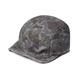 Detail view of American vintage five-panel camo cap with short brim and metal eyelets